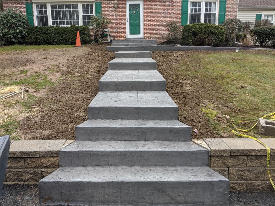 Grey steps leading up to home